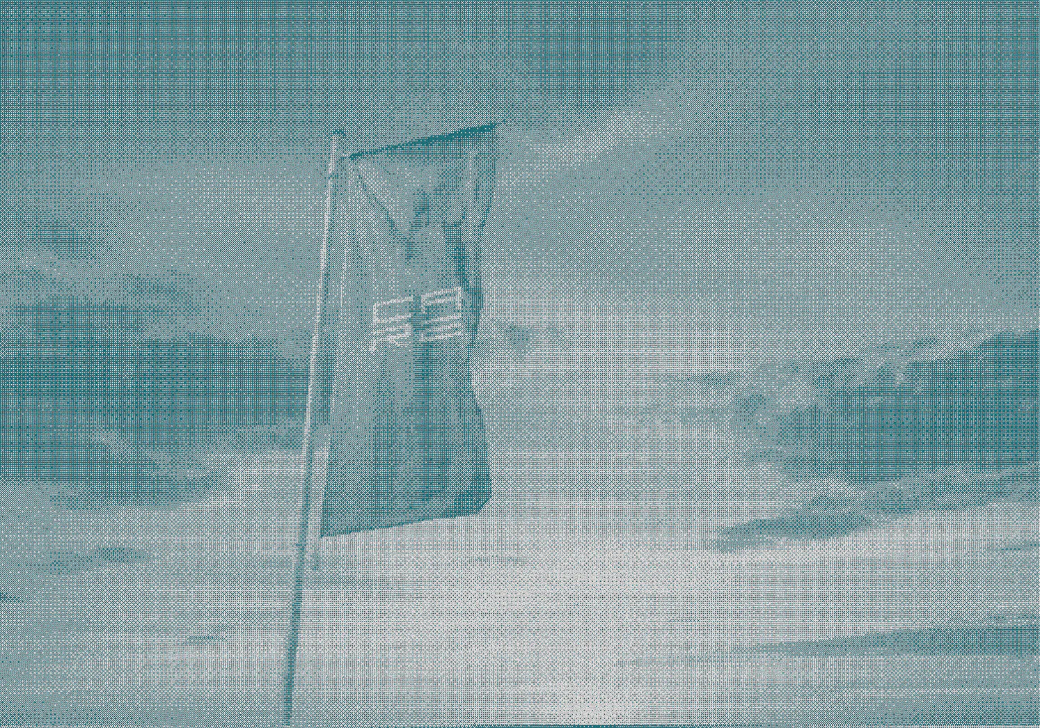 The Care Flag on a cloudy day